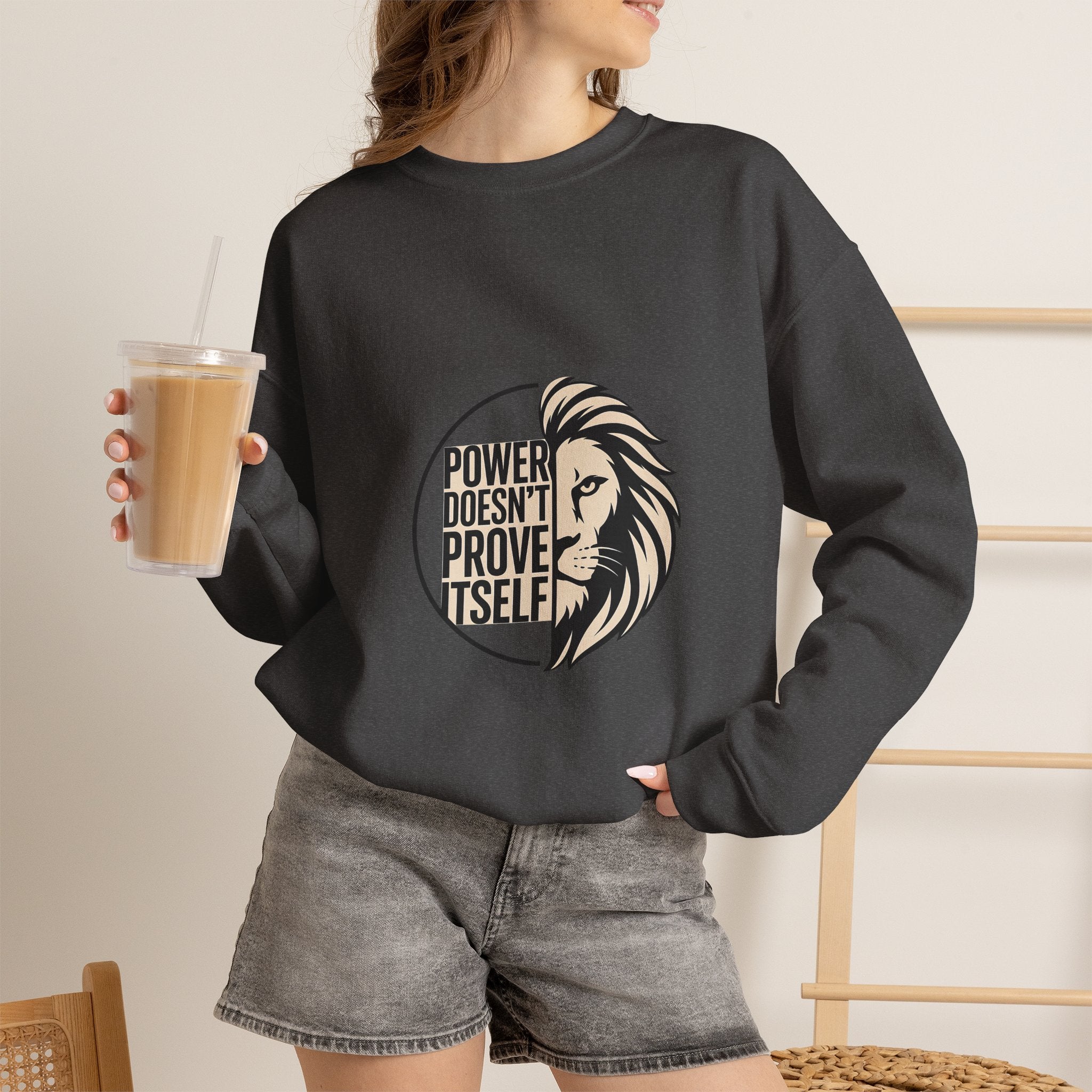 Crewneck Sweatshirt — "Power Doesn't Prove Itself" Lion Graphic Motivational Pullover