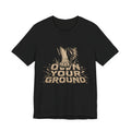 T‑Shirt — Own Your Ground Graphic Tee (Boot Print Design)