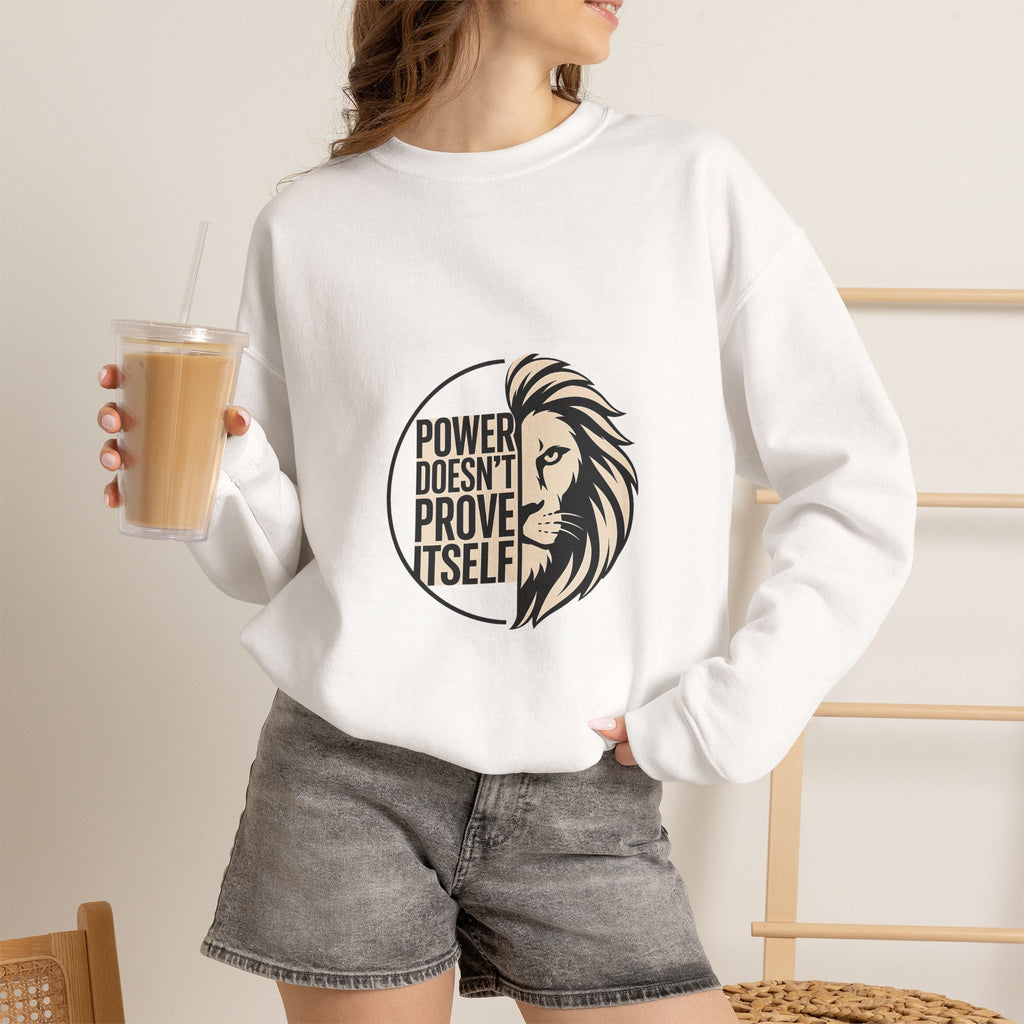 Crewneck Sweatshirt — "Power Doesn't Prove Itself" Lion Graphic Motivational Pullover