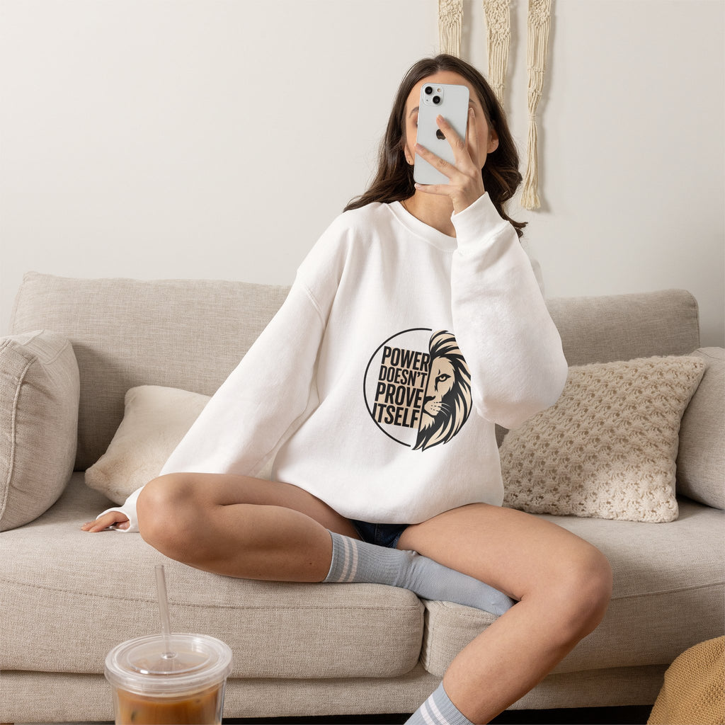 Crewneck Sweatshirt — "Power Doesn't Prove Itself" Lion Graphic Motivational Pullover