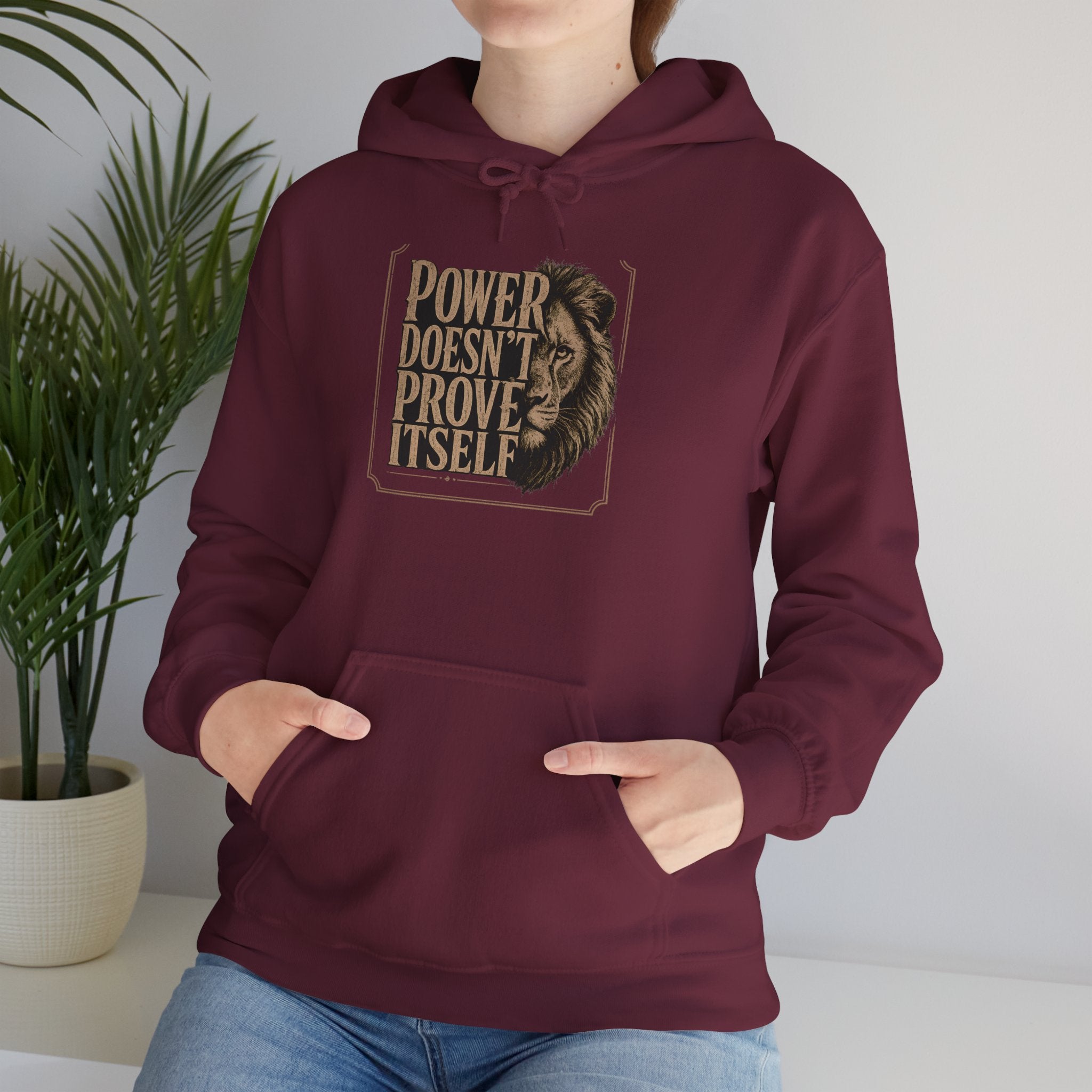 Power Doesn't Prove Itself Hoodie — Bold Vintage Lion Graphic