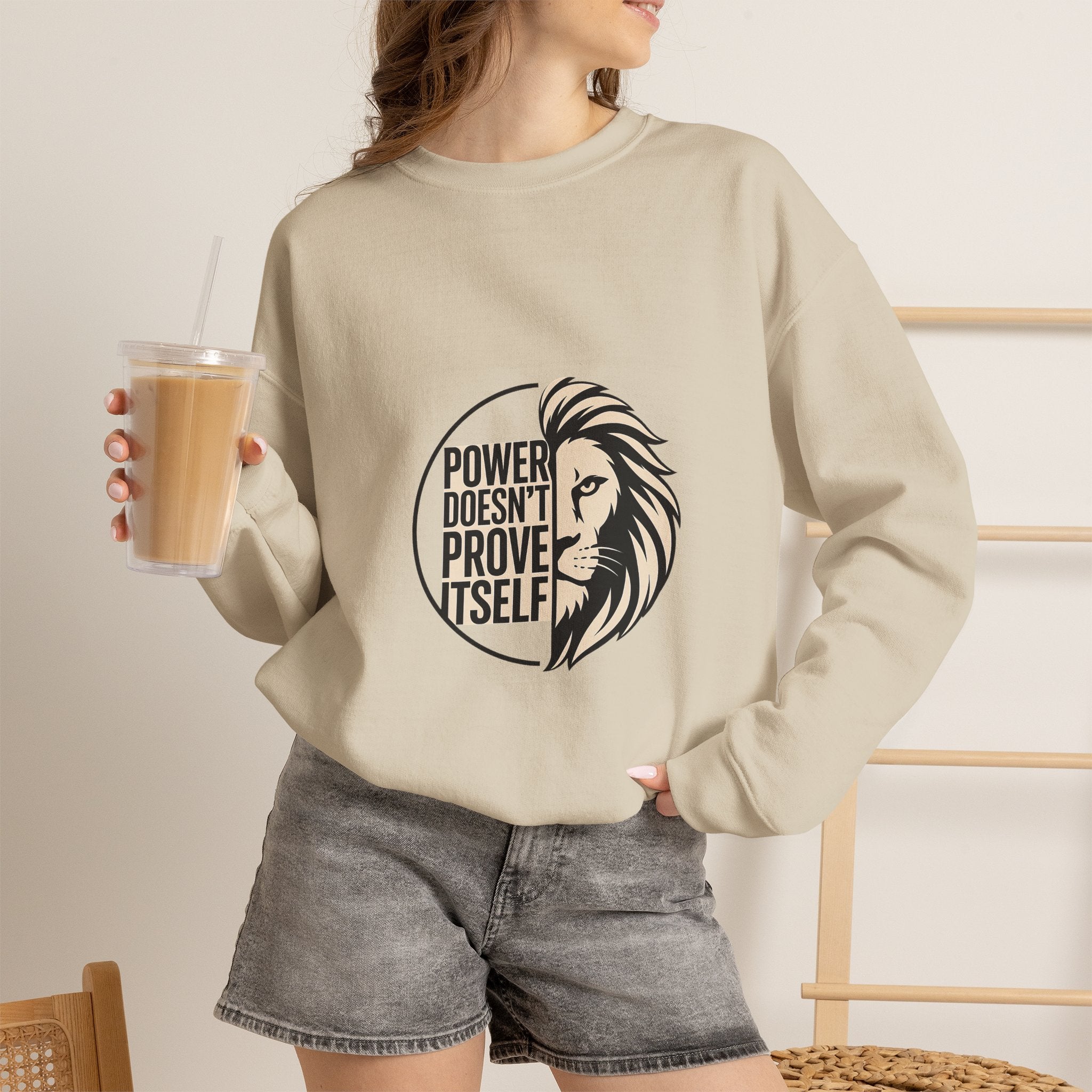 Crewneck Sweatshirt — "Power Doesn't Prove Itself" Lion Graphic Motivational Pullover