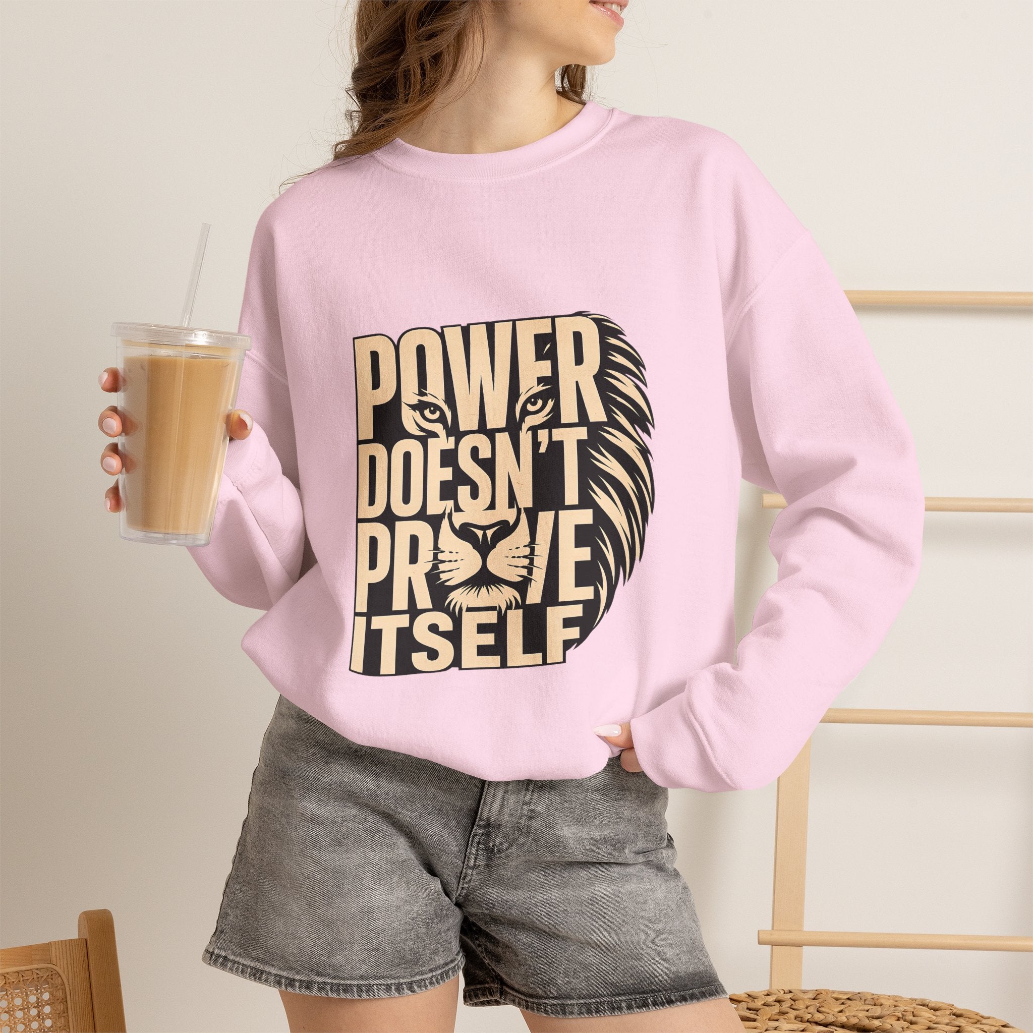 Crewneck Sweatshirt — "Power Doesn't Prove Itself" Lion Graphic