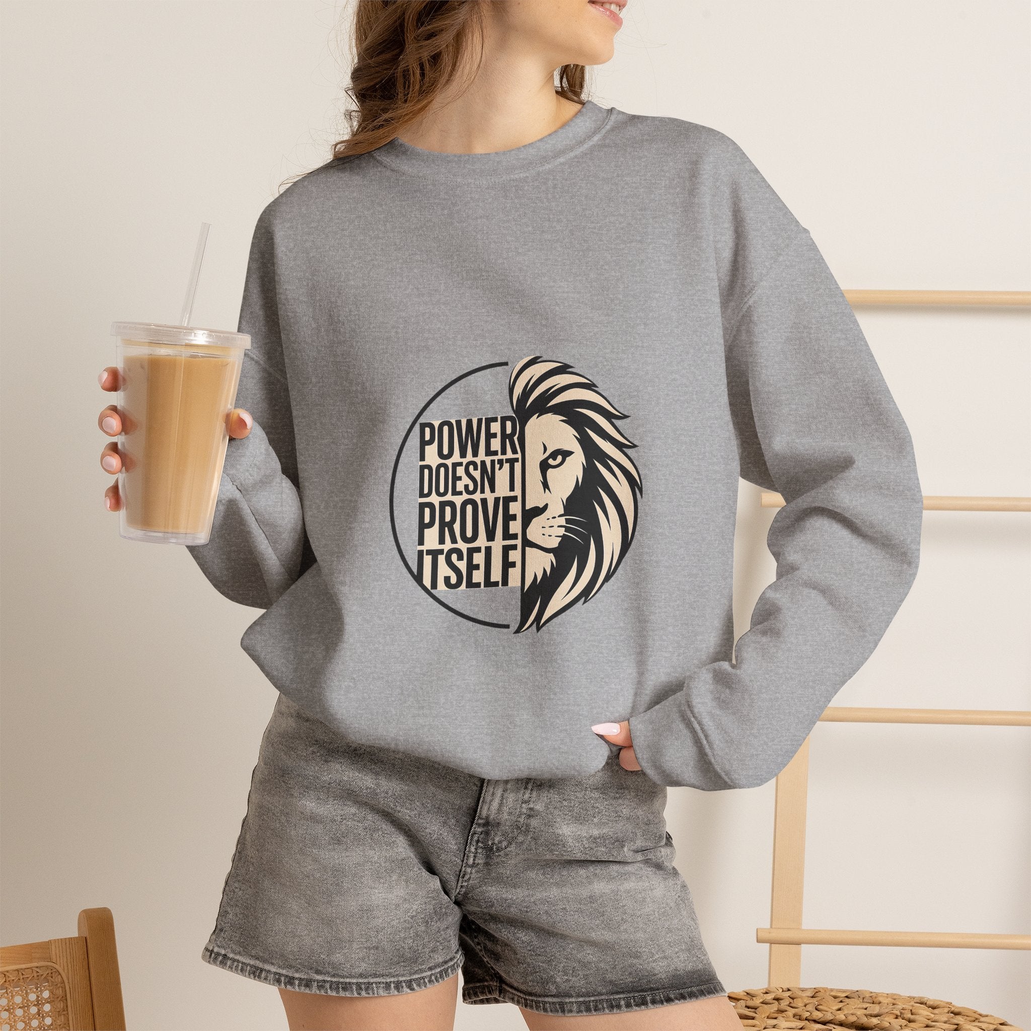 Crewneck Sweatshirt — "Power Doesn't Prove Itself" Lion Graphic Motivational Pullover