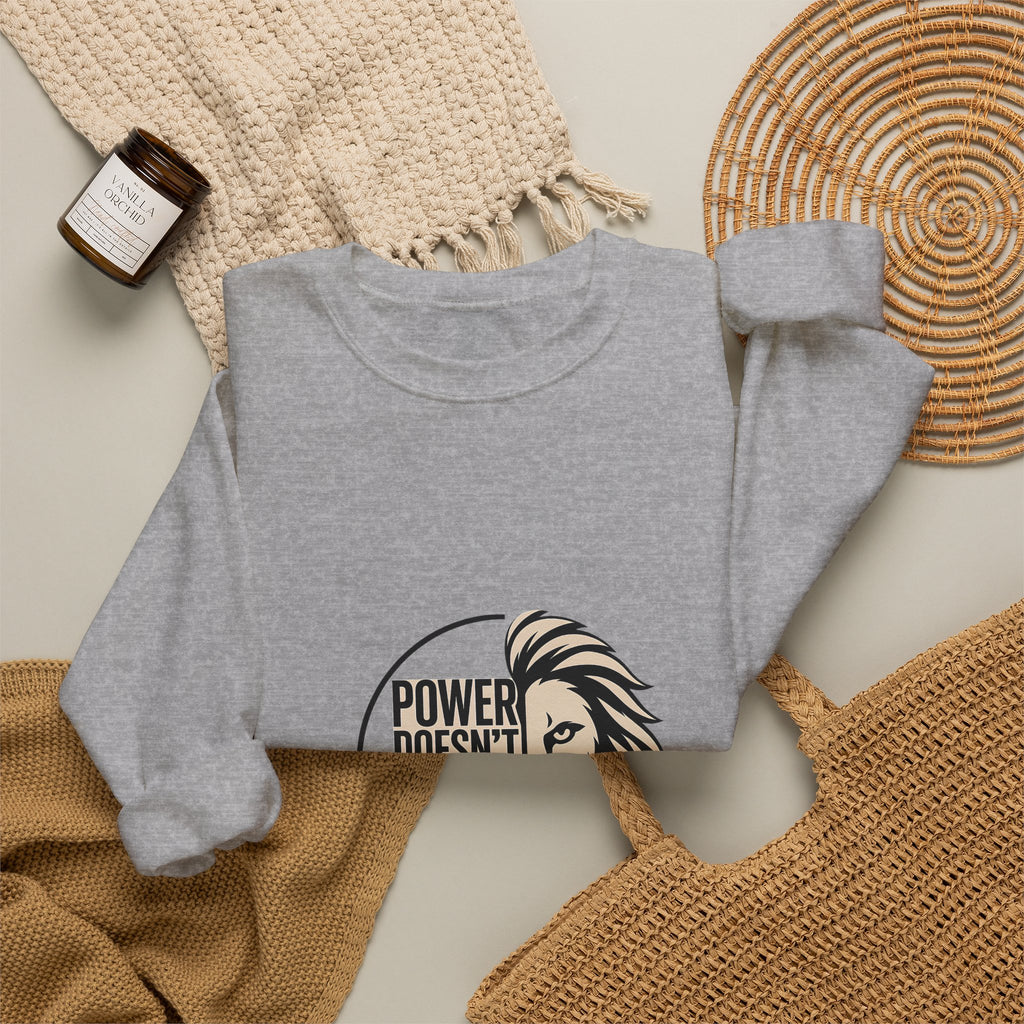 Crewneck Sweatshirt — "Power Doesn't Prove Itself" Lion Graphic Motivational Pullover